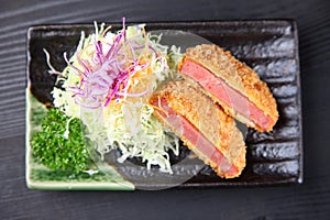 Japanese stile ham cutlet on a dining table