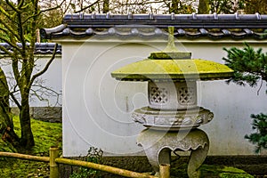 Japanese stone tower in a Asian garden, Traditional garden architecture