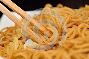 Japanese Street Food Fried Yakisoba Noodles with wooden Chopsticks