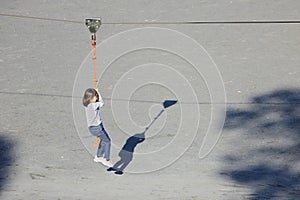 Japanese student girl playing with flying fox