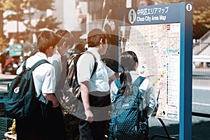Japanese students and map