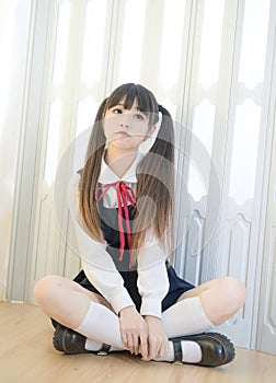 Japanese style cute school girl indoor home woman