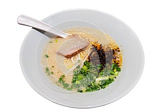 Japanese style Ramen bowl with miso soup pork chilli paste vegetable on white background cut out with clipping path