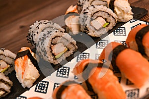 Japanese sushi food, Maki ands rolls with tuna, salmon, shrimp, crab and avocado