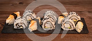 Japanese sushi food, Maki ands rolls with tuna, salmon, shrimp, crab and avocado