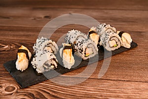 Japanese sushi food, Maki ands rolls with tuna, salmon, shrimp, crab and avocado