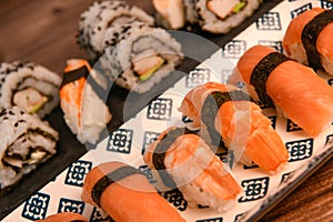 Japanese sushi food, Maki ands rolls with tuna, salmon, shrimp, crab and avocado