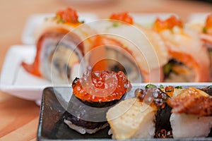 Japanese sushi. Roll made of Smoked fish and roe.