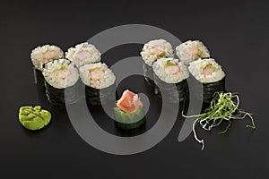 Japanese sushi rolls decorated with wasabi