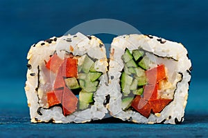 Japanese sushi rolls with tuna and fresh vegetables wrapped in r