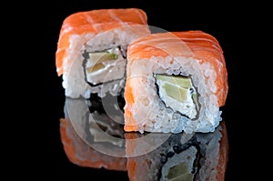 Japanese sushi with salmon avocado rice.