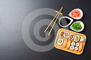 Japanese sushi with soy sauce, ginger and algae salad