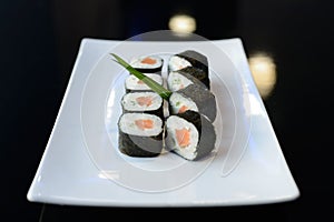 Japanese sushi on a white plate.