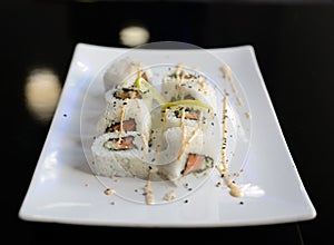 Japanese sushi on a white plate.