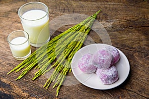 Japanese sweet black sesame daifuku with rice milk and ear of ri