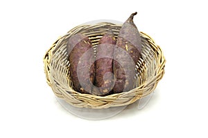 Japanese sweet potato in the basket isolated on white background