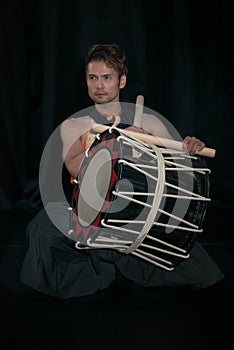 Japanese Taiko drummer with drum