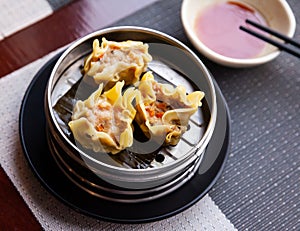 Japanese tasty dumplings siumai in steamer, nobody