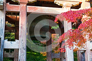 Japanese temple bell in autumn garden