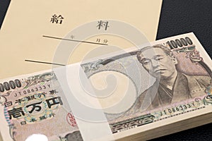 Japanese ten thousand yen in a salary bag