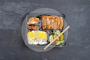 Japanese tonkatsu bento in takeaway box