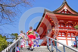 Japanese tourists and foreigners put on a dress yukata for visit the atmosphere inside the Kiyomizu-dera temple. Japan during