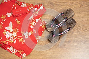 Japanese traditional geta sandal and traditional clothes of Kimono, Yukata on wooden floor