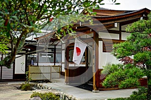 Japanese Traditional House with Flag
