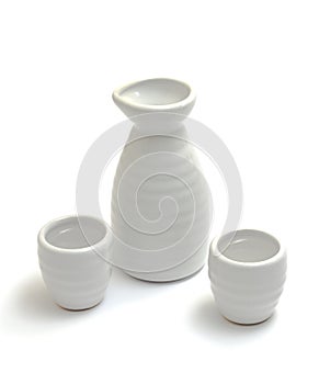 Japanese traditional sake cups and bottle isolated