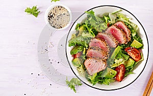 Japanese traditional salad with pieces of medium-rare grilled Ahi tuna