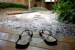 Japanese traditional sandal with the background of garden