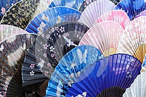 Japanese traditional sensu fans in different patterns