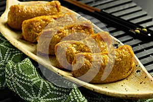 Japanese traditional type of sushi Inari-zushi photo