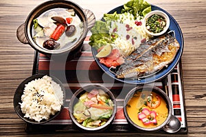 Japanese tray meal with fried fish rice and soup in asian restaurant