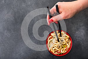 Japanese udon noodles with chopstick