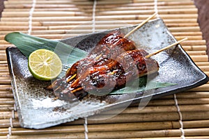 Japanese unagi (eel) Kushiyaki, Skewered and Grilled Meat photo