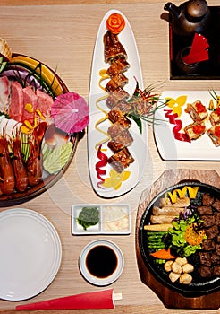 Japanese Unagi Maki roll, Sashimi, Beef Teppanyaki, Salmon maki