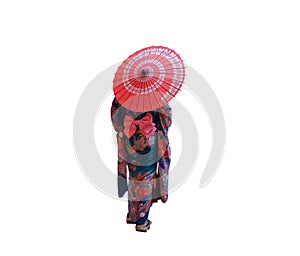 Japanese woman. Back view of young geisha wearing kimono costume with red umbrella isolated on white background. Kyoto, Japan