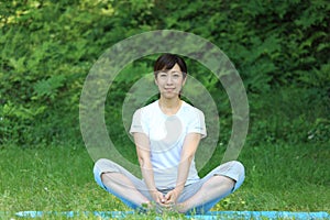 Japanese woman doing stretch