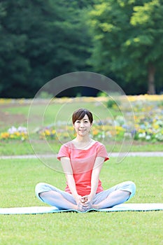 Japanese woman doing stretch