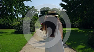 Japanese woman is walking in garden