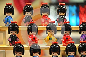 Japanese wooden kokeshi dolls in Kimono suit, which are a toy for girls and boys