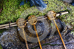 Japanese wooden ladles at Shinto temple