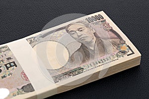 Japanese yen. 10,000 yen bundle of bills.