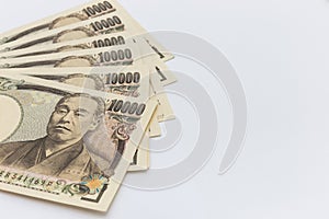 Japanese yen banknotes concept on white background