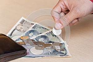 Japanese yen banknotes management for exchange and trading. Manage salaries, income, and expenses to be balanced. Financial,