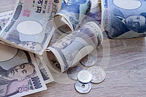 Japanese yen notes and Japanese yen coins for money concept background