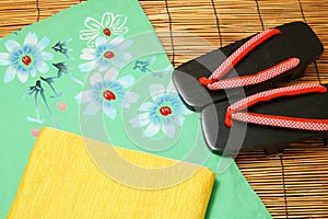 Japanese yukata, obi, and sandals.