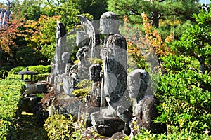 Stone Buddhas at Japanese temple, Kyoto Japan photo