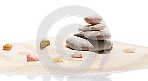 Japanese zen stone garden and sea stones on beach sand